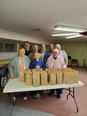 Our Street Eats team helping to make goodies for our Street friends.