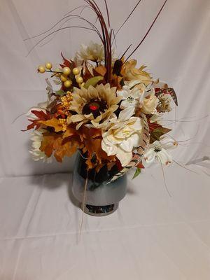 A perfect silk floral arrangement to welcome Fall. Beautiful variety of velvety cream flowers, fall leaves, a smoky mirrored glass vase.