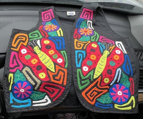 This is a legit hand appliquéd tourist mola vest from Panama. A score for $2.