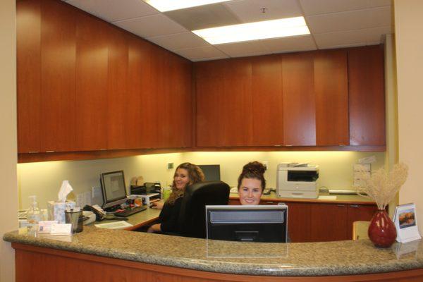 Ashley and Denise at the front desk.