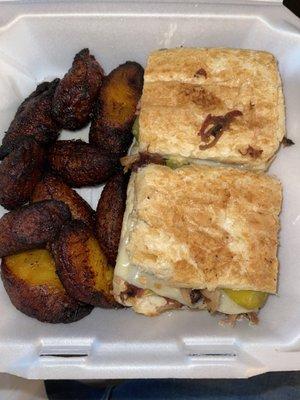 Cuban sandwich with a side of plantains.