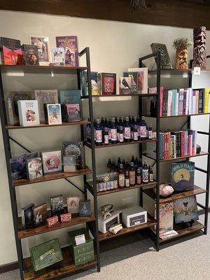 We carry a variety of books, clearing & manifestation sprays, and decks (Tarot, Oracle & more!).