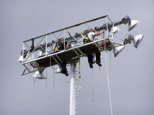 At the top of the 120ft light tower rewiring 1500W lights