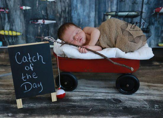 Newborn photo session with fishing theme