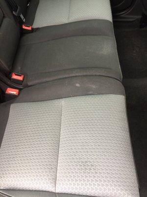 Stained seats. Low Fluid warning. Not vacuumed between rentals.  These pictures were sent to corporate and no ownership of issue.