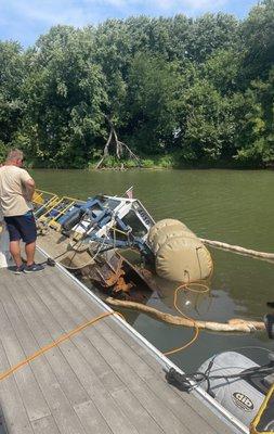 Dredge barge recovery on Ohio River at LMPD dock.