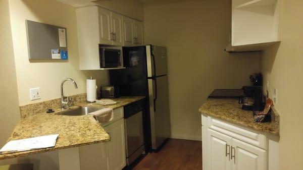 Full kitchen in king-size one-bedroom suite