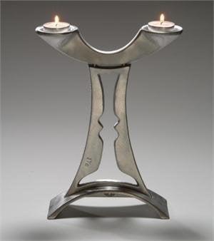 Cast aluminum candleholder from Israel uses either tapers or tea lights.