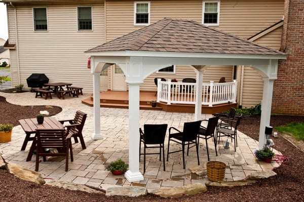 Pappas Landcare and Construction created a great vinyl pavilion to complete the look of this backyard. 