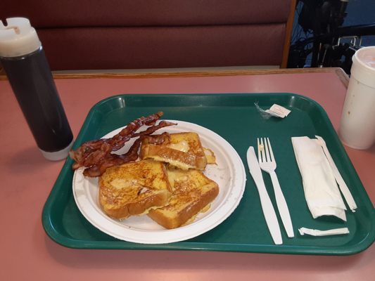 French Toast, and well cooked Bacon. My fountain Orange Fanta, and the Syrup.