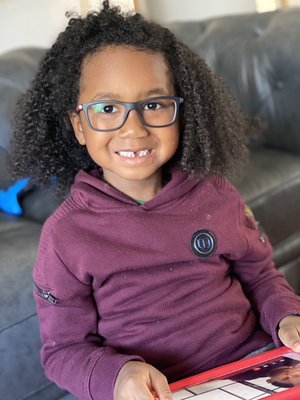 My son happy with his new glasses