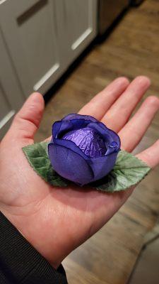 A single piece of hazelnut chocolate wrapped as a rose.