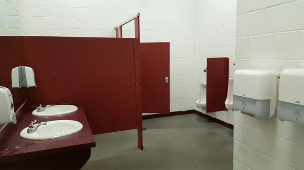 Very nice bathroom for an amateur hockey rink.