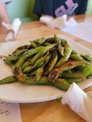 Edemame...grilled...steamed...and coated with awesome mild chili blend and salt. Flavor was excellent. Highly recommend.