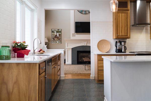 Possibly our favorite kitchen/living room flow and design yet! This home belongs on HGTV! Photo by Luxe Life Productions!