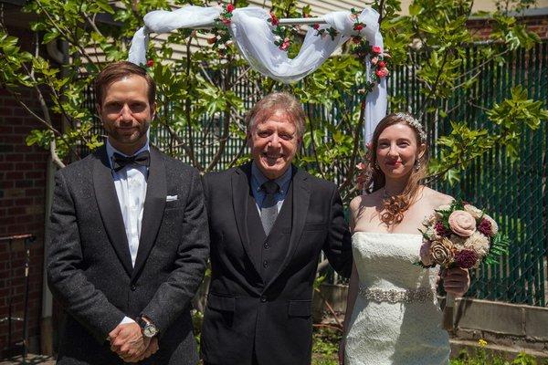 With our wonderful officiant Mark