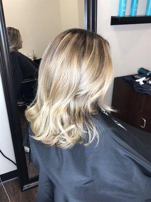 Blonde balayage with a shadow root