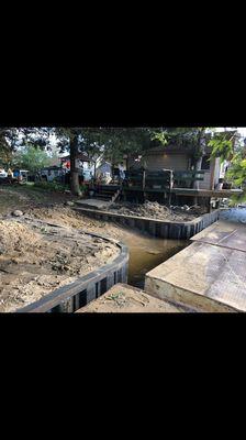 a sea wall we did for a homeowner on the river, at the time the water level was high, when the water level receded it gave them beach access