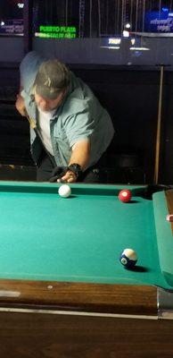 Playing in the Marbles Pool Tournament