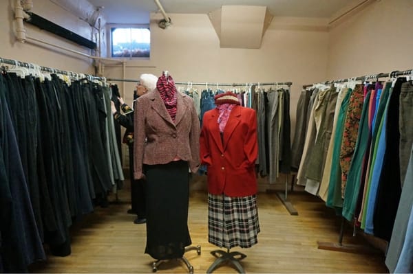 Several rooms of gently used quality women's clothes