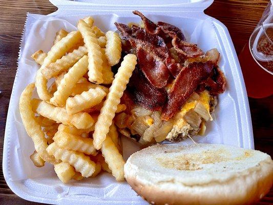 The Cess-nator- 12oz beef burger, bacon, sautéed onions, and cheddar cheese plus crinkle cut fries - about $15, huge burger!