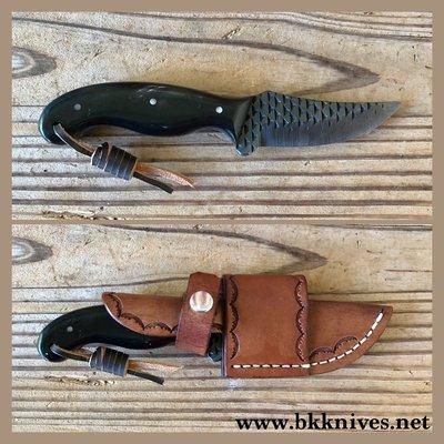 6 3/4 in Rasp skinner with a black Buffalo handle