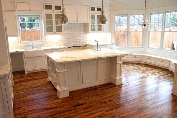 Full kitchen remodel
 Custom cabinets + callacata marble + porcelain backsplash tile.