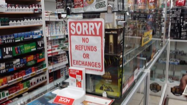 That sign doesn't cover Defective products sold within the business. I Think $5.50 for any defective product is wrong