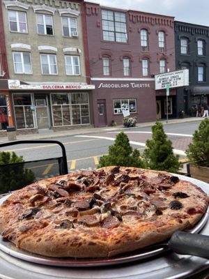 Delicious sausage and mushroom pizza