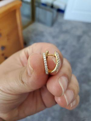 Yellow gold huggies! I love them so much because they're more oval than round and form to my ear for a more "huggie" fit.