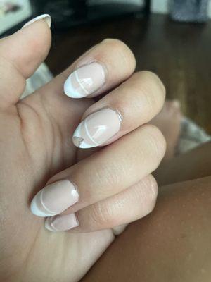 Chipped gel, wavy pinky finger.