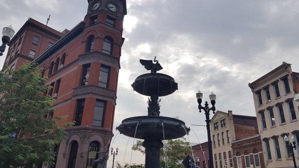 This is the Flat Iron building in which Key Bank is located. The building has the shape of a clothes iron.