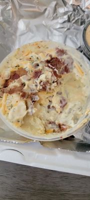 Don't let a half eaten low quality photo fool you - that cheddar, bacon potato salad is the real deal