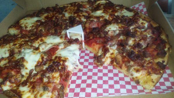 Wildcat. Pizza!! Meaty and cheesy... Super crust, and the sauce pops!