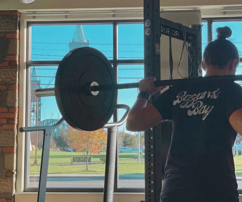 Squat Rack and curved treadmill with a view!