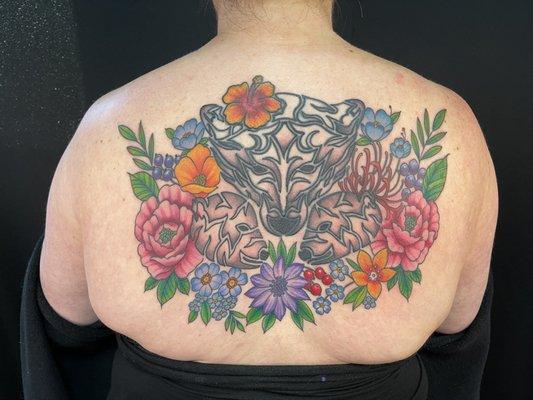 Large back piece.  The momma bear and one baby were old and he re-did them, added the 2nd baby bear, flowers and bear shading.