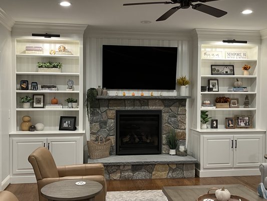 Bookcases and cabinets I built with custom made paneling.