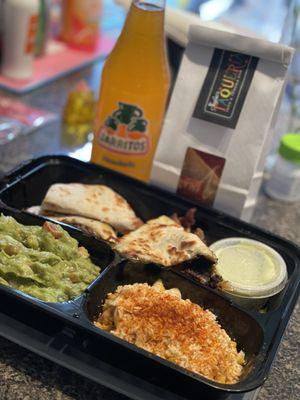 Steak quesadillas, guacamole and eloté (street corn)