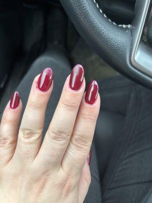 Polish is messed up, bloody cuticle on the ring finger, crooked nails