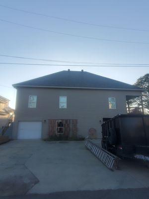 Driveway view of the house.