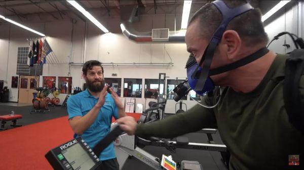 Coach Ray giving  breakdown while conducting a VO2-submax assessment.