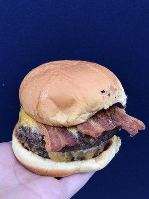 A&E Burger ($8) Double Patty (+ $7) with Bacon (+ $1.50) and NY Cheddar (+ $1) = $17.50