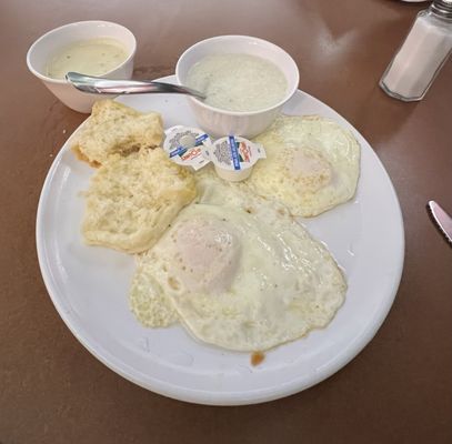 Eggs, biscuit, gravy and grits