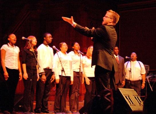 Gene Kelly conducts CRLS Vocal Ensemble at Joyful Noise. Sanders Theatre, Cambridge, Ma. 2008.