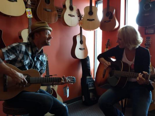 Season Ammons and Allen Rayfield trying out some Martin Guitars