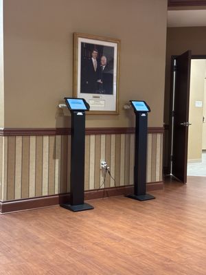 Computerized check-in stations for use when you arrive