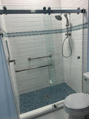 Shower with barn doors.