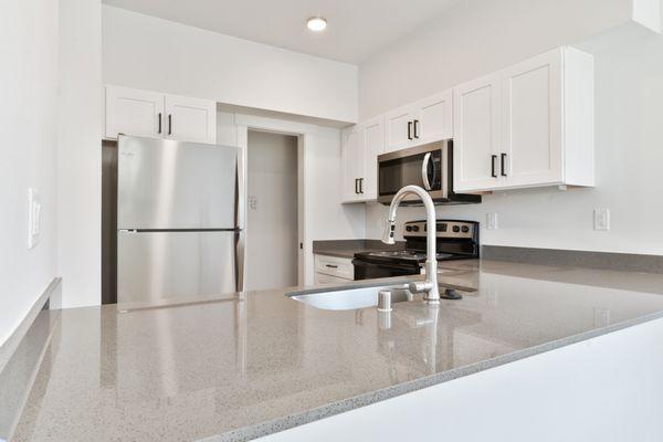 DDN White Cabinets With Grey Countertops