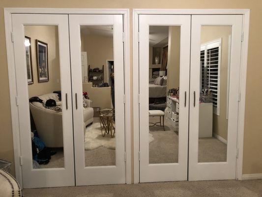 Designed and built walk-in closet. Originally three gold sliding panels, now contemporary chic. What an improvement!