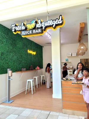 Family owned, organic juice, smoothie bar. Entrance is on the top floor near AMC & Lego Land.